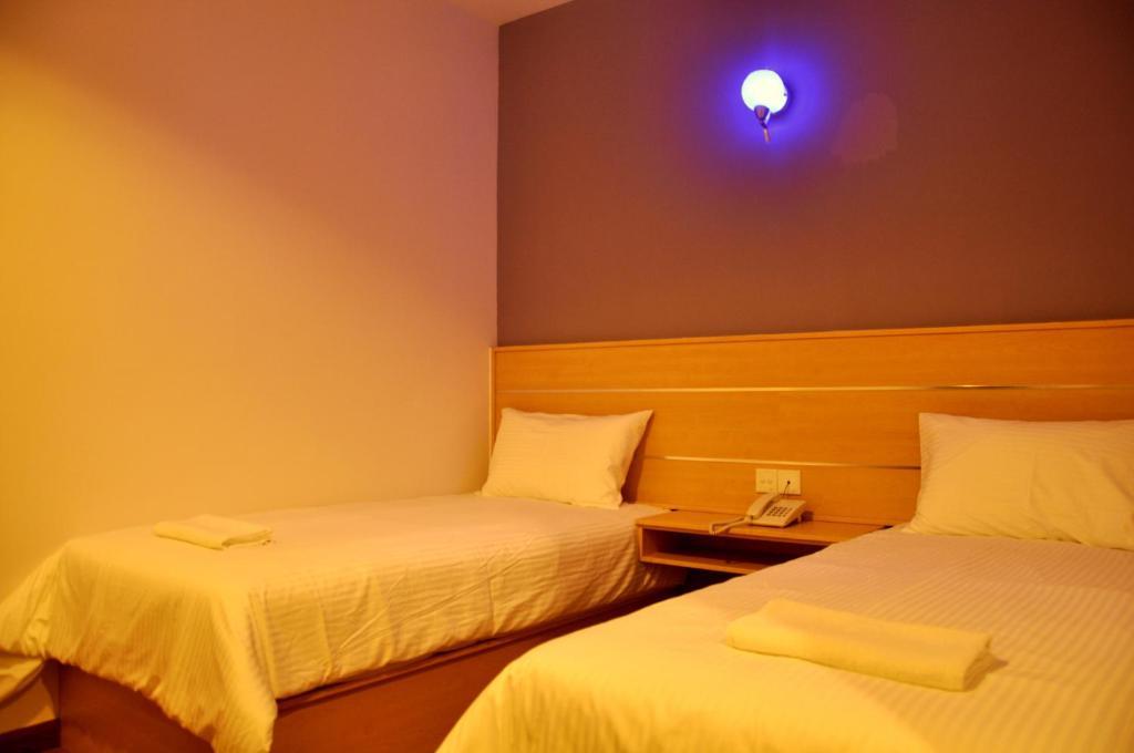 Hotel Economy Kapar Quarto foto